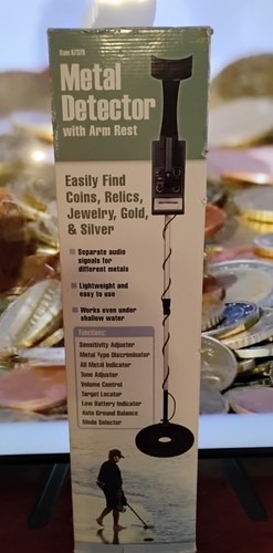 Metal detector with - arm, rest